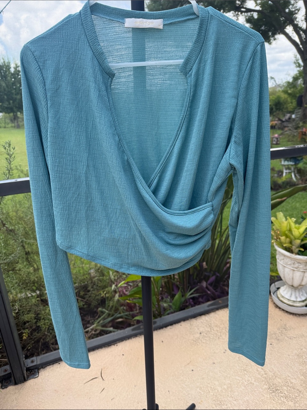 Emerald Wrap-Front Cropped Long-Sleeve Top